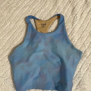 Size 14.16 workout top it runs big enough for me. Small female